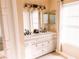Bathroom with double vanity, ample storage, and stylish lighting at 8556 Tidal Bay Ln, Tampa, FL 33635