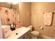 Charming bathroom featuring grey vanity, decorative shower curtain, and neutral finishes at 8556 Tidal Bay Ln, Tampa, FL 33635