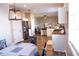 Open concept kitchen with stainless steel appliances, granite countertops, and seamless flow to the living area at 8556 Tidal Bay Ln, Tampa, FL 33635