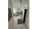 Well-equipped kitchen featuring stainless steel appliances, granite countertops, and marble floors at 8603 Egret Point Ct, Tampa, FL 33647