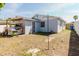 View of the backyard with storage shed and ample space at 9105 Suffield Ct, Tampa, FL 33615