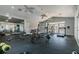 Bright fitness center features modern equipment, fans, mirrored walls, and ample space for a complete workout at 9481 Highland Oak Dr # 404, Tampa, FL 33647