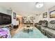Open living area with kitchen, dining, and living spaces, offering a modern design at 9481 Highland Oak Dr # 404, Tampa, FL 33647