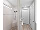 Stylish bathroom featuring a modern shower with a built-in seat and sleek fixtures at 809 Seascape Pl, Sarasota, FL 34240