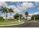 Street view of the Shoreview at Lakewood Ranch Waterside community entrance with lush tropical landscaping at 809 Seascape Pl, Sarasota, FL 34240
