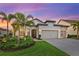 Charming single-Gathering home with a well-manicured lawn and a two-car garage at 809 Seascape Pl, Sarasota, FL 34240
