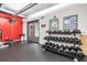 Gym with free weights, training equipment, and instructional charts for a full workout at 101 N 12Th St # 306, Tampa, FL 33602