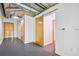 Hallway featuring minimalist design with sliding barn doors and gray concrete flooring at 101 N 12Th St # 306, Tampa, FL 33602