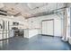 Bright, modern kitchen with stainless steel appliances and concrete ceilings at 101 N 12Th St # 306, Tampa, FL 33602