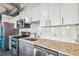 Well-equipped kitchen features stainless steel appliances, granite countertops, and a stainless sink at 101 N 12Th St # 306, Tampa, FL 33602
