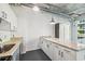 Modern kitchen showcases granite countertops, stainless steel appliances, and white cabinetry at 101 N 12Th St # 306, Tampa, FL 33602