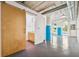 A bright living space with an open floor plan, concrete ceilings, and modern finishes at 101 N 12Th St # 306, Tampa, FL 33602