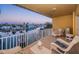 Comfortable balcony with cozy seating and scenic views of the waterfront and homes at 11595 Gulf Blvd # 6, Treasure Island, FL 33706
