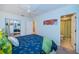 Inviting bedroom includes a queen size bed and features a closet and ensuite at 11595 Gulf Blvd # 6, Treasure Island, FL 33706