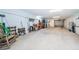 Spacious garage with tools and work benches, offering ample storage and workspace at 11595 Gulf Blvd # 6, Treasure Island, FL 33706