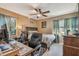 Bedroom featuring a ceiling fan, neutral paint, and two windows at 1269 80Th N Ave, St Petersburg, FL 33702