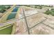 Aerial view of planned community showcasing layout of roads and common areas, ready for new homes to be built at 13162 Goldstone Ct, Wimauma, FL 33598