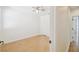Bedroom with wood-look flooring, ceiling fan, and double door closet at 14542 Mirabelle Vista Cir, Tampa, FL 33626