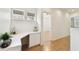 Hallway with a built-in desk area and drawers at 14542 Mirabelle Vista Cir, Tampa, FL 33626