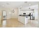 Modern kitchen with white cabinets, stainless steel appliances, and dark countertops at 14542 Mirabelle Vista Cir, Tampa, FL 33626