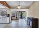 Bright dining area with tile floors, offering easy access to the kitchen and a view of the backyard at 15099 Community Ave, Port Charlotte, FL 33953