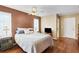 Comfortable main bedroom with hardwood floors and ample closet space at 15099 Community Ave, Port Charlotte, FL 33953