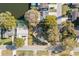 An aerial view of the property and the surrounding neighborhood including the boundary line at 1549 San Christopher Dr, Dunedin, FL 34698