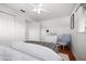 This is a nice, clean bedroom with a chair and dresser at 1549 San Christopher Dr, Dunedin, FL 34698