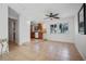 Open living room features tile floors and is near the kitchen at 1549 San Christopher Dr, Dunedin, FL 34698