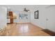 Open living room features tile floors and is near the kitchen at 1549 San Christopher Dr, Dunedin, FL 34698
