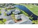 An aerial view of an immaculate residential neighborhood near a pristine pond at 2175 Corinne S Ct # A, St Petersburg, FL 33712