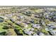 An aerial view of a neighborhood with mature trees and well maintained landscaping at 2175 Corinne S Ct # A, St Petersburg, FL 33712