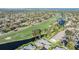 An aerial view showcasing a golf course community by the water at 2175 Corinne S Ct # A, St Petersburg, FL 33712