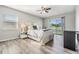 Sun-filled main bedroom with a sliding glass door overlooking the backyard at 2175 Corinne S Ct # A, St Petersburg, FL 33712