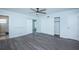 Bedroom featuring new flooring, closets and bathroom entrance at 2321 Ecuadorian Way # 41, Clearwater, FL 33763