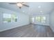 Spacious room features a modern gray tone floor and lots of light at 2321 Ecuadorian Way # 41, Clearwater, FL 33763