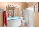 Well-lit bathroom with a modern shower, vanity, and sink at 2469 Nantucket Harbor Loop # 123, Sun City Center, FL 33573
