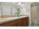 Double sink bathroom with granite countertops and access to a shower and toilet at 501 Washita Stone Dr, Ruskin, FL 33570