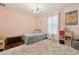 This charming bedroom features a pastel color scheme and a plush rug at 501 Washita Stone Dr, Ruskin, FL 33570