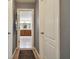 Hallway leading to bathroom with dual vanities at 501 Washita Stone Dr, Ruskin, FL 33570