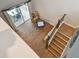Open loft area overlooking the backyard with a dining set and comfortable seating at 501 Washita Stone Dr, Ruskin, FL 33570