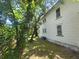 Exterior of home with some green space and partial view of backyard at 5121 40Th N Ave, St Petersburg, FL 33709