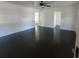 Spacious living room featuring hardwood floors and white walls at 5121 40Th N Ave, St Petersburg, FL 33709