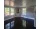 Bright room with large windows and a built-in display cabinet is perfect for entertaining guests at 5121 40Th N Ave, St Petersburg, FL 33709