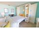 Inviting living space with a pull-out bed and built-in shelving for ample storage and display at 6025 Shore S Blvd # 611, Gulfport, FL 33707