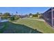 Wide backyard lawn with a covered boat dock, ideal for relaxing and boating at 6324 Balboa Ln, Apollo Beach, FL 33572