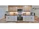 Updated kitchen features modern appliances, stylish countertops, and ample cabinet space at 6324 Balboa Ln, Apollo Beach, FL 33572