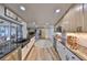 Open kitchen layout featuring stainless steel appliances, sleek countertops, ample cabinet space, and a seamless flow at 6324 Balboa Ln, Apollo Beach, FL 33572