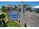 View of Finn's Dockside Bar & Grill sign in Apollo Beach, FL, with parking and nearby condos at 6324 Balboa Ln, Apollo Beach, FL 33572