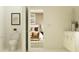 Bathroom view into furnished bedroom provides a cohesive look at 6862 E 115Th St, Palmetto, FL 34221